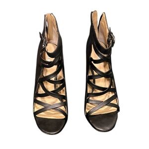 Nine West Black Strappy Heels in great condition, size 9.‎